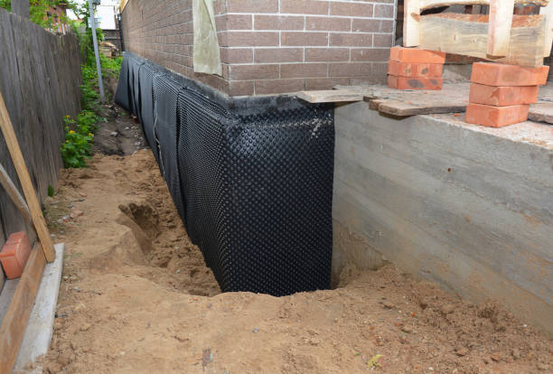 Happy homeowners after waterproofing job in Toughkenamon